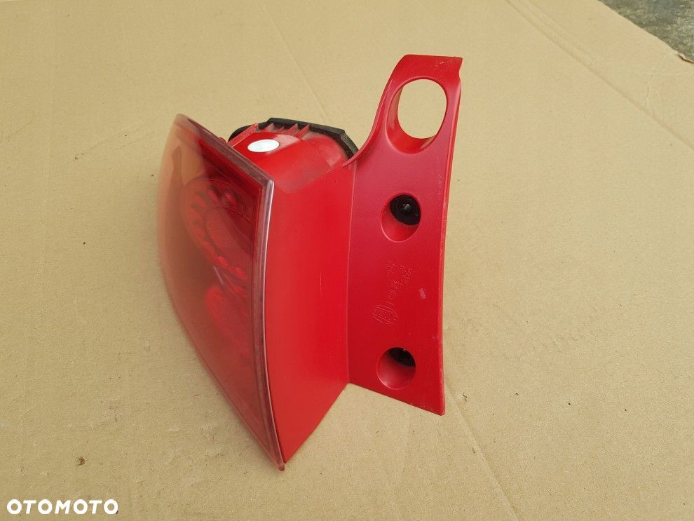 SEAT LEON II 05- LEWA TYLNA LAMPA ORYGINAŁ 1P0945111D STAN BDB - 10