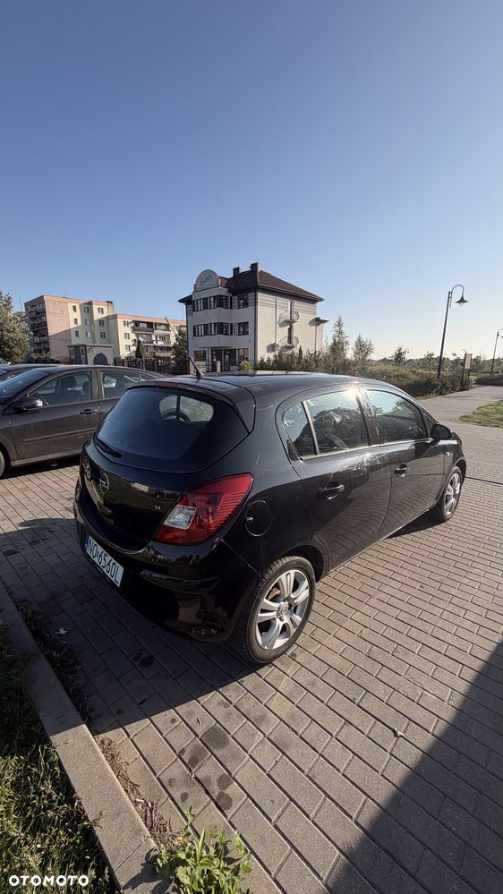 Opel Corsa 1.4 16V Cosmo - 5