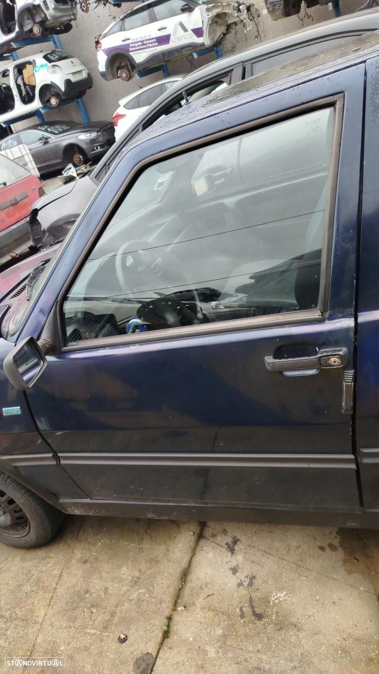 Porta frente esquerda FIAT Uno (146_) - 1