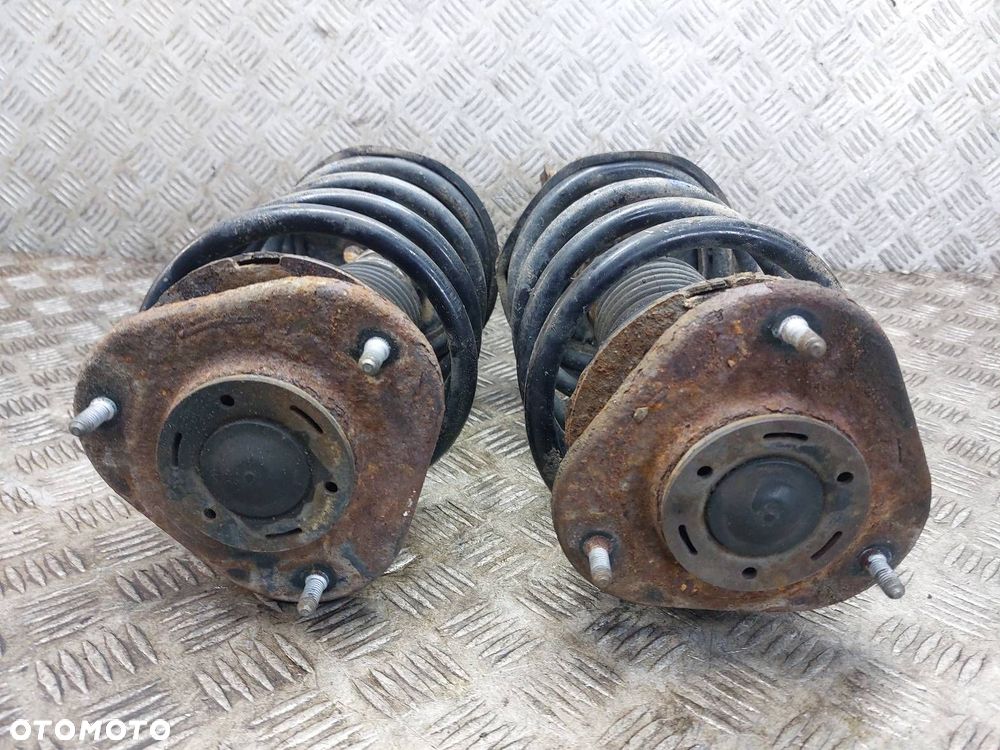 AMORTYZATOR + SPRĘŻYNA LEWY PRZÓD + PRAWY PRZÓD COROLLA E12 1.4 16V - 2