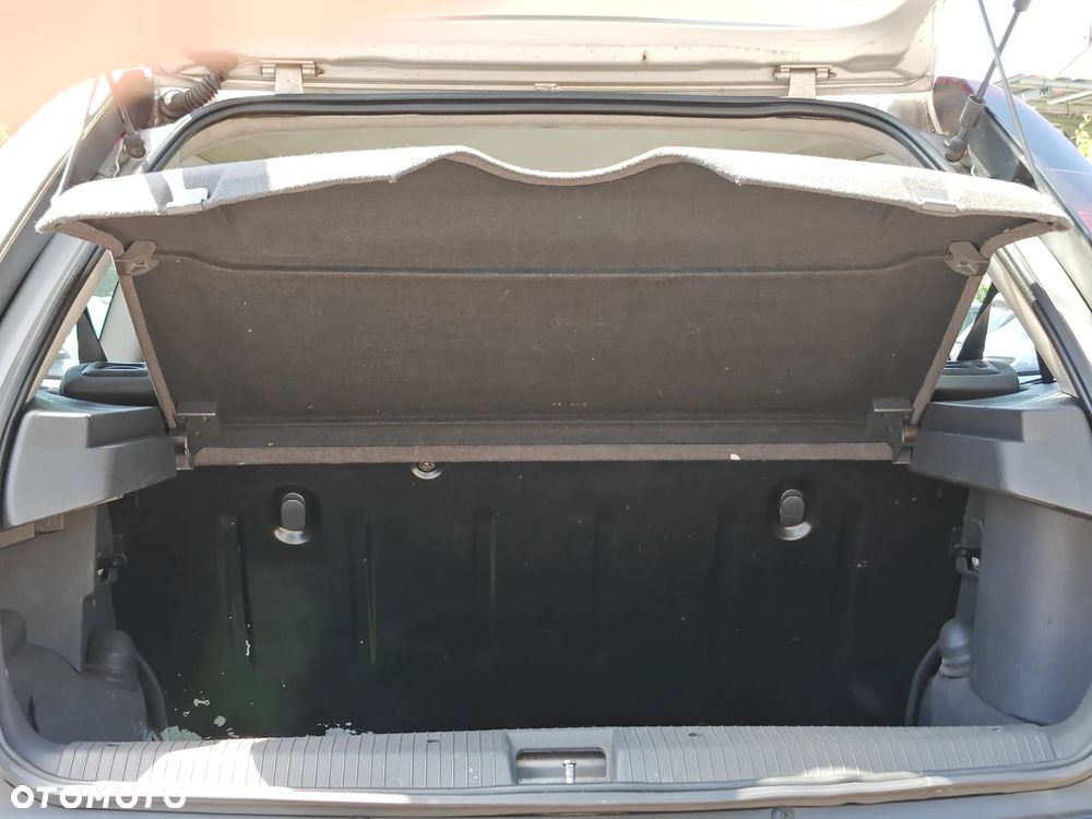 Opel Corsa 1.2 16V Enjoy - 18