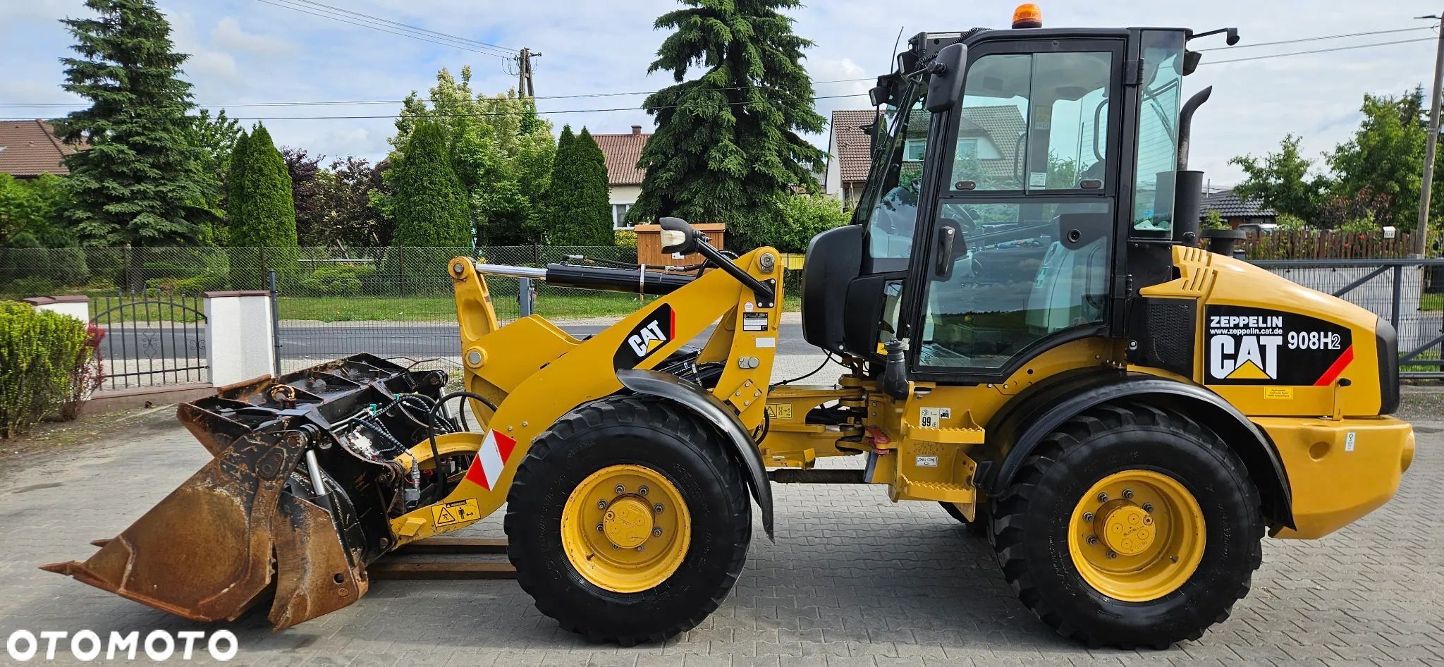 Caterpillar 908H2 z 2013 rok tylko 4700 mtg! z Niemiec - 1