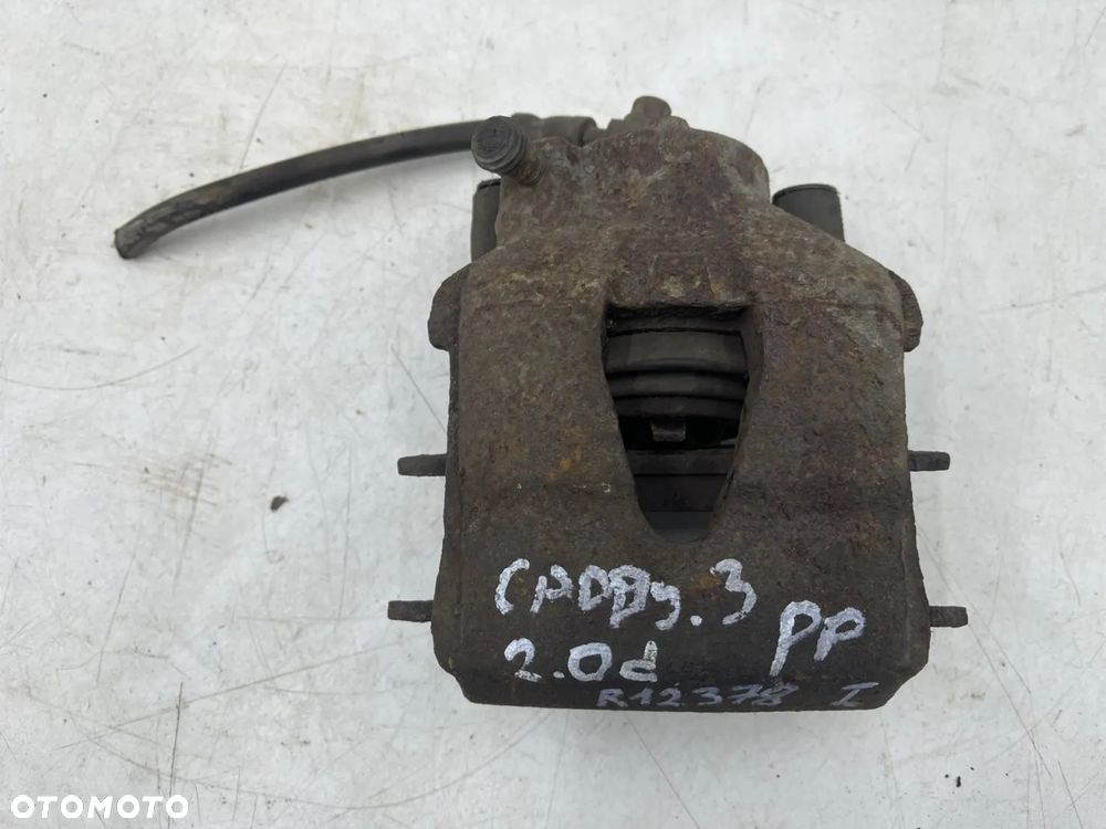 Zacisk hamulcowy VW Golf IV V VI Polo III IV Audi A3 8l 8p Leon I II Ibiza III IV Fabia I II III Octavia I II Caddy III 97-12r. prawy przedni jarzmo - 2