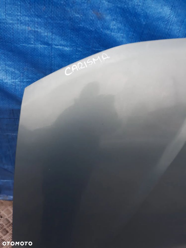 MASKA MITSUBISHI CARISMA  KOLOR: G64  2002r - 2