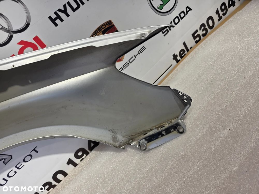 AUDI 8V0 HB , LIFT 12-20 ŁADNY LEWY BŁOTNIK PRZEDNI PRZÓD SREBRNY METALIK NR AUKCJI BŁ266 - 20