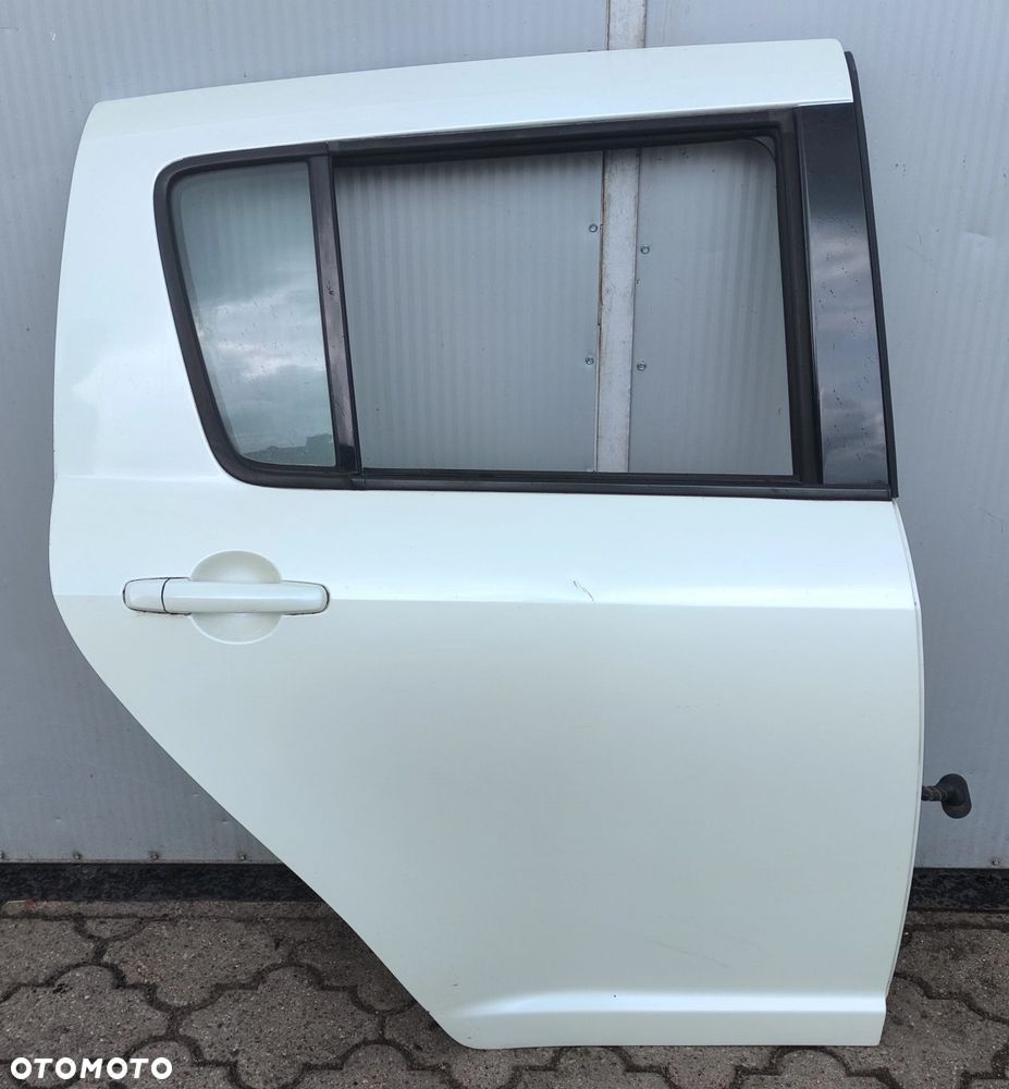 Swift IV MK6 drzwi tylne tył PRAWE lift kolor: Z7T stan bdb 04-10r Suzuki - 1