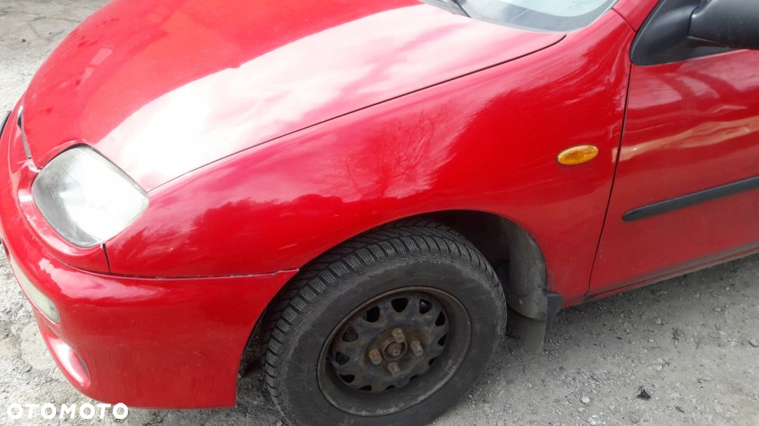 Mazda 323 323c ba 94-98 Maska lampa zderzak pas atrapa w kolor SU - 7