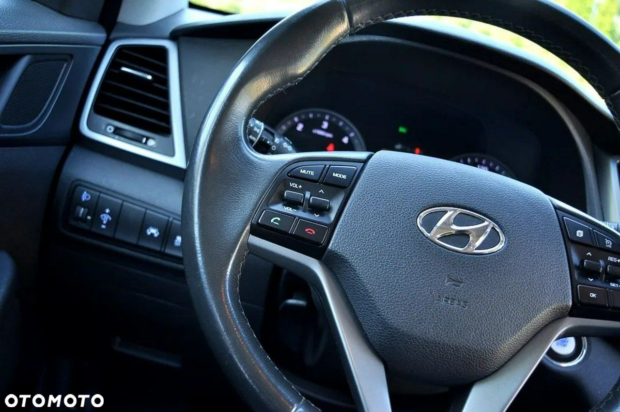 Hyundai Tucson blue 1.7 CRDi 2WD Intro Edition - 30