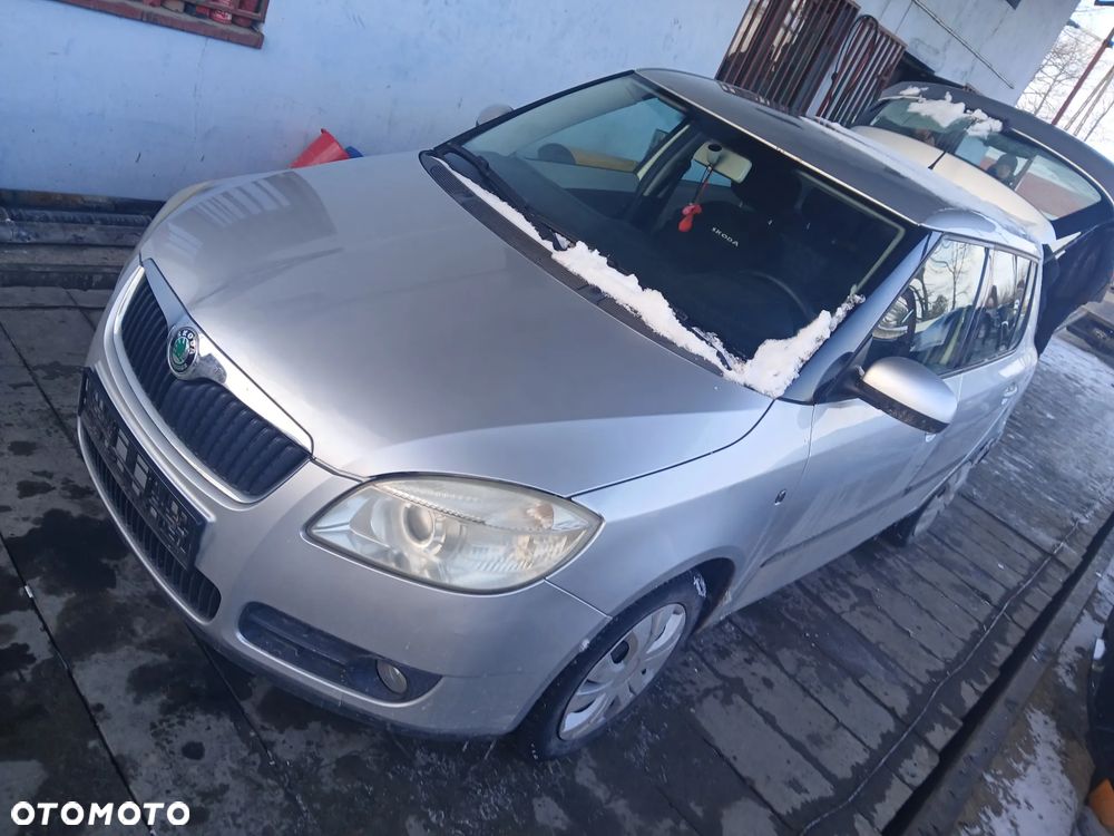 skoda fabia II silnik 1.2 BZG skrzynia JUS sanki belka przód tył wahacz zacisk zwrotnica