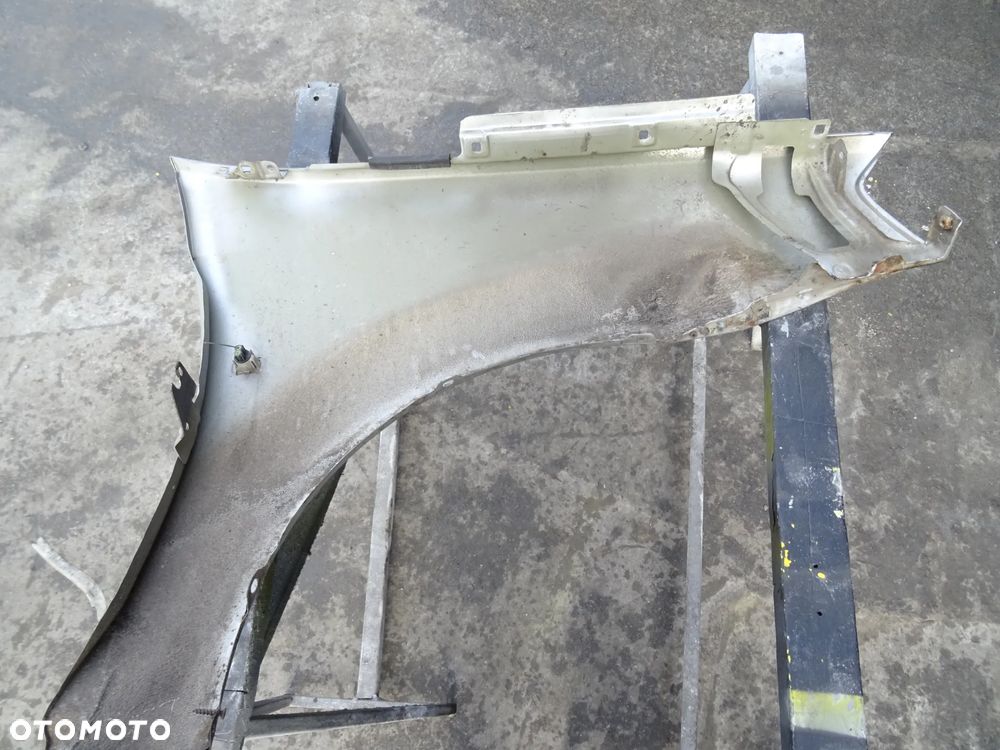 Błotnik Dacia Logan Lewy Przód - 7