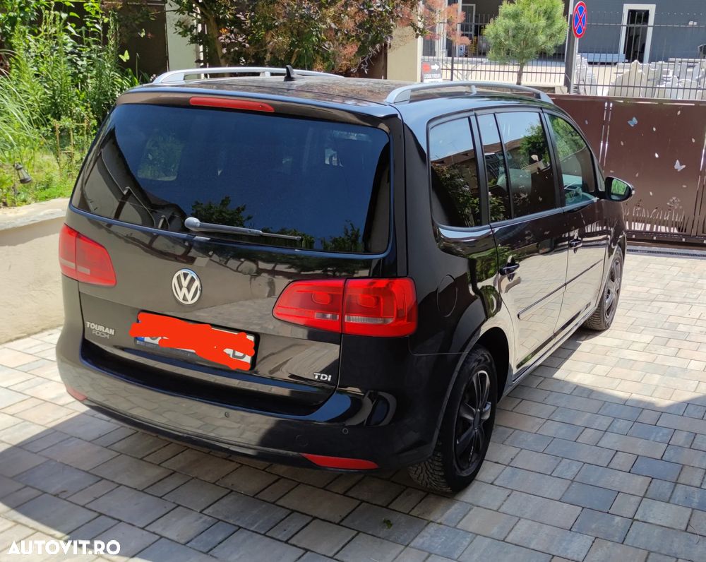 Volkswagen Touran 1.6 TDI DSG Comfortline - 1