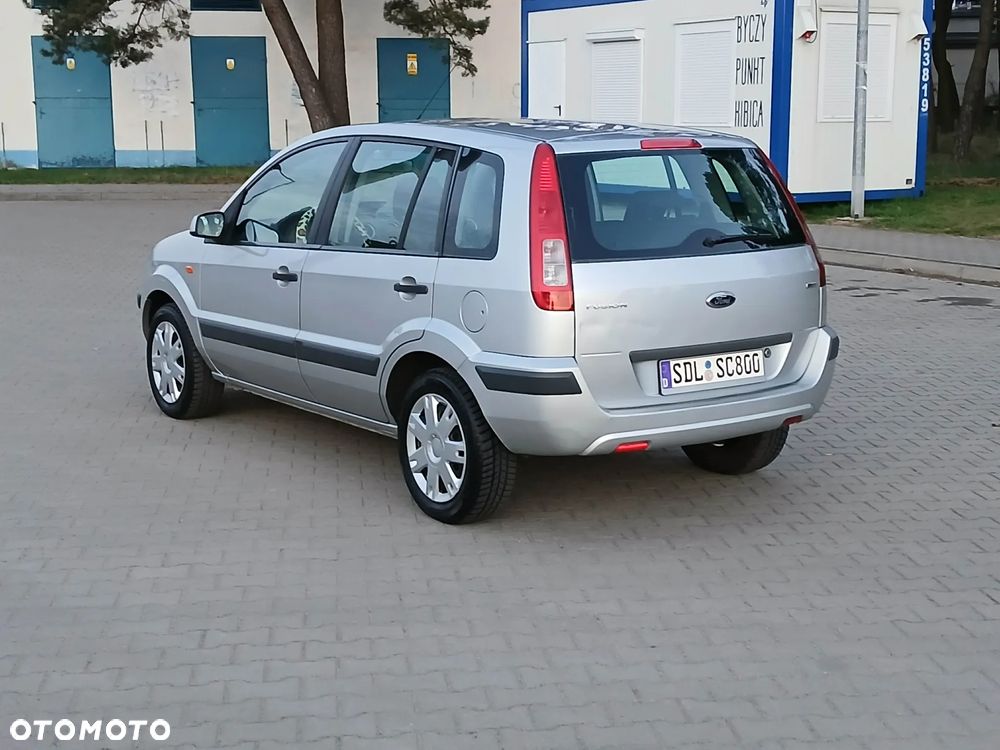 Ford Fusion 1.4 TDCI + - 4