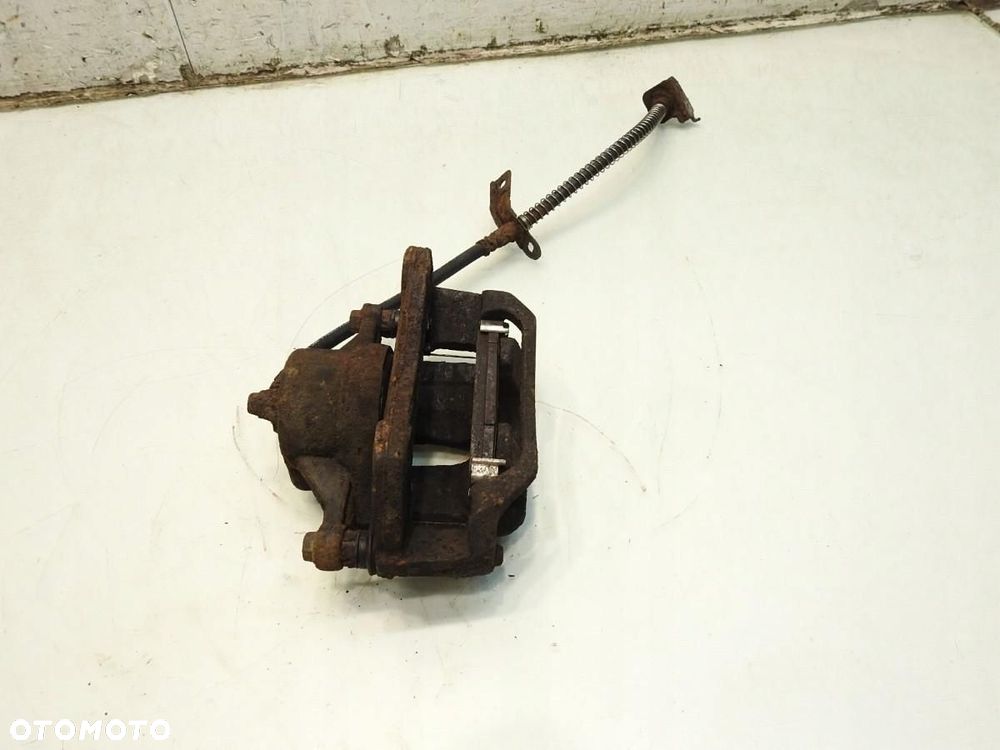 ZACISK HAMULCOWY LEWY PRZÓD KIA CEED I 1.6 GDI - 3