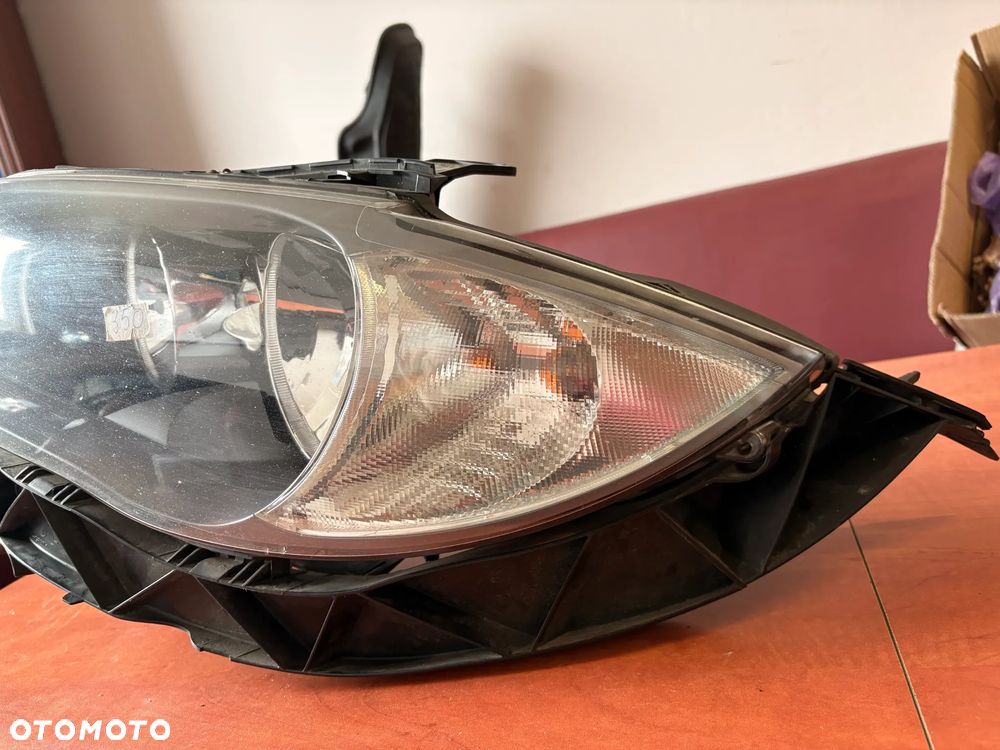 LAMPA LEWA PRZEDNIA BMW 1 E87 ORYGINAŁ HELLA 69406639 - 2