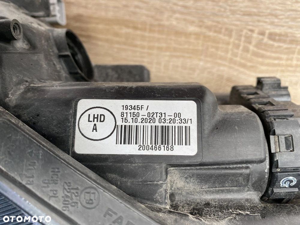 LAMPA PRZEDNIA LEWA TOYOTA COROLLA E21 SEDAN SOCZEWKA 81150-02T31-00 - 6