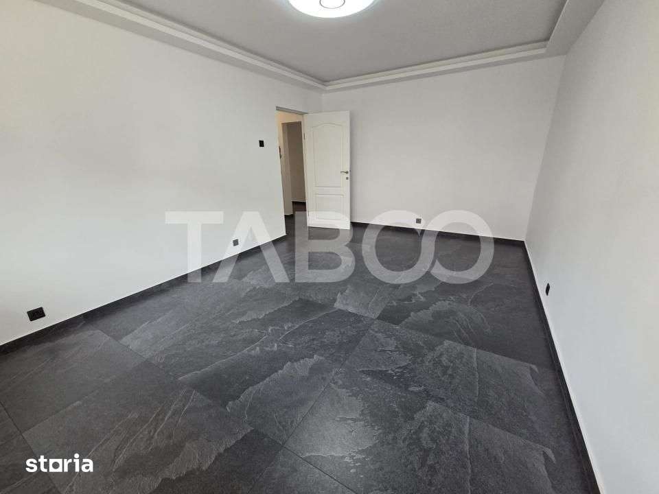 Apartament 4 camere 2 bai 2 balcoane etajul 1 renovat complet 2026 — fotografia 3