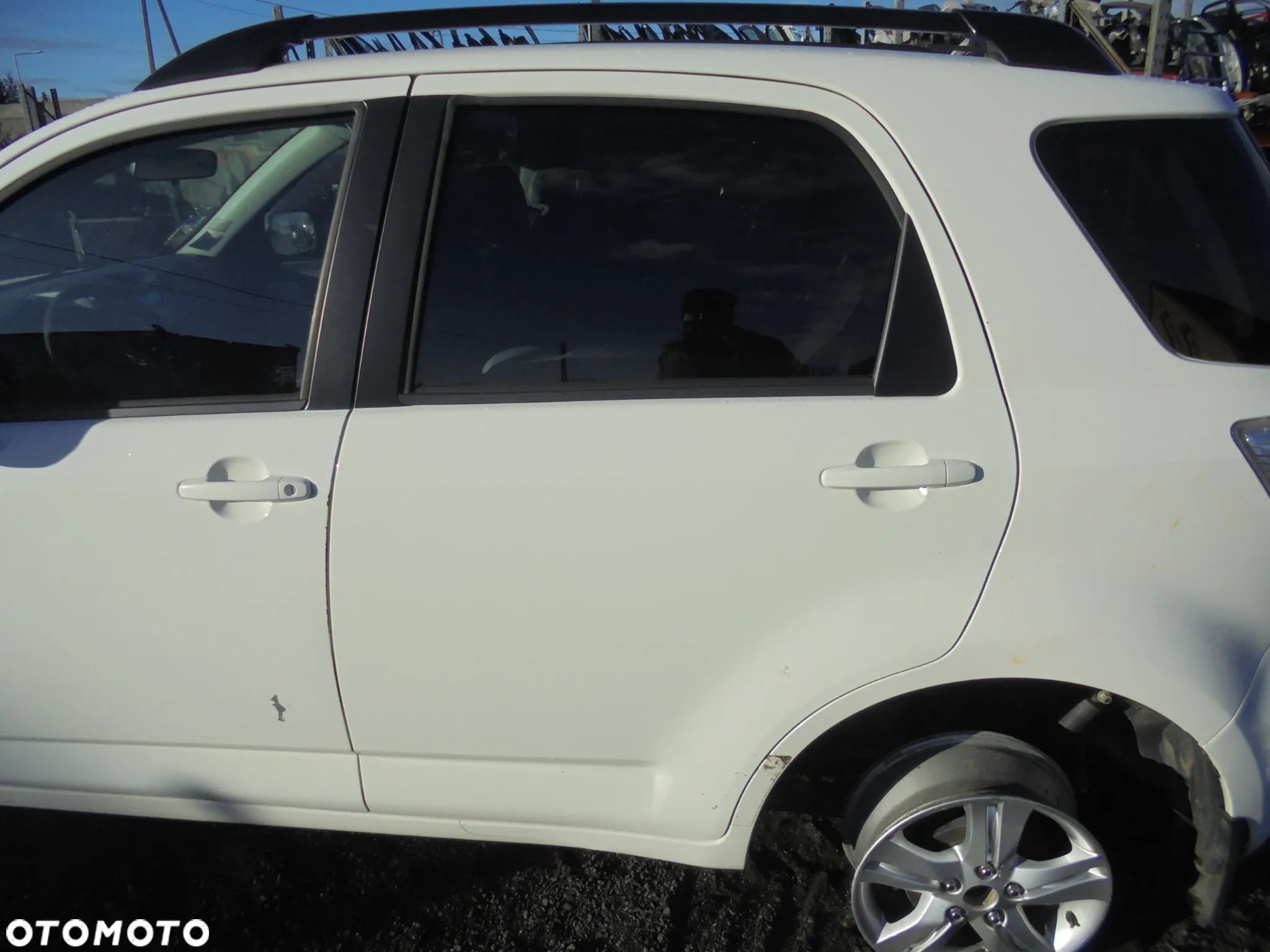 DAIHATSU TERIOS II 06-> DRZWI TYŁ LEWE KOMPLETNE ŁADNE - 1