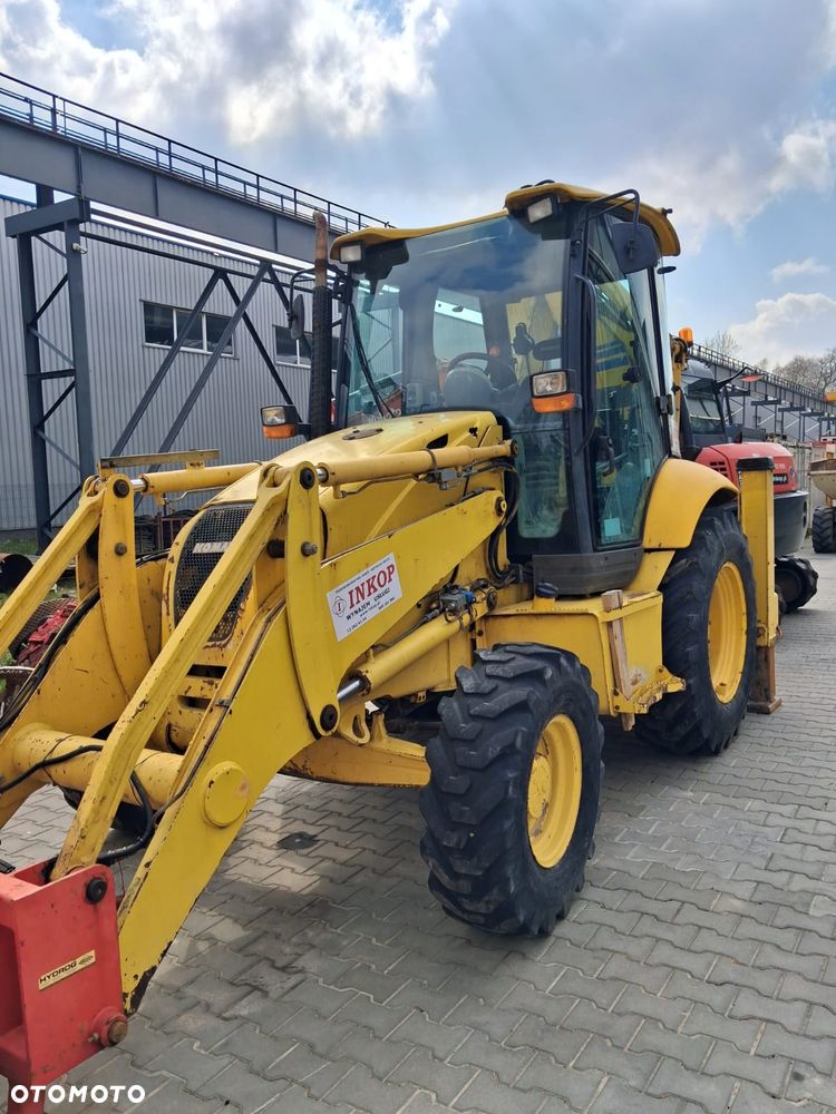 Komatsu WB97R-5E0 - 1