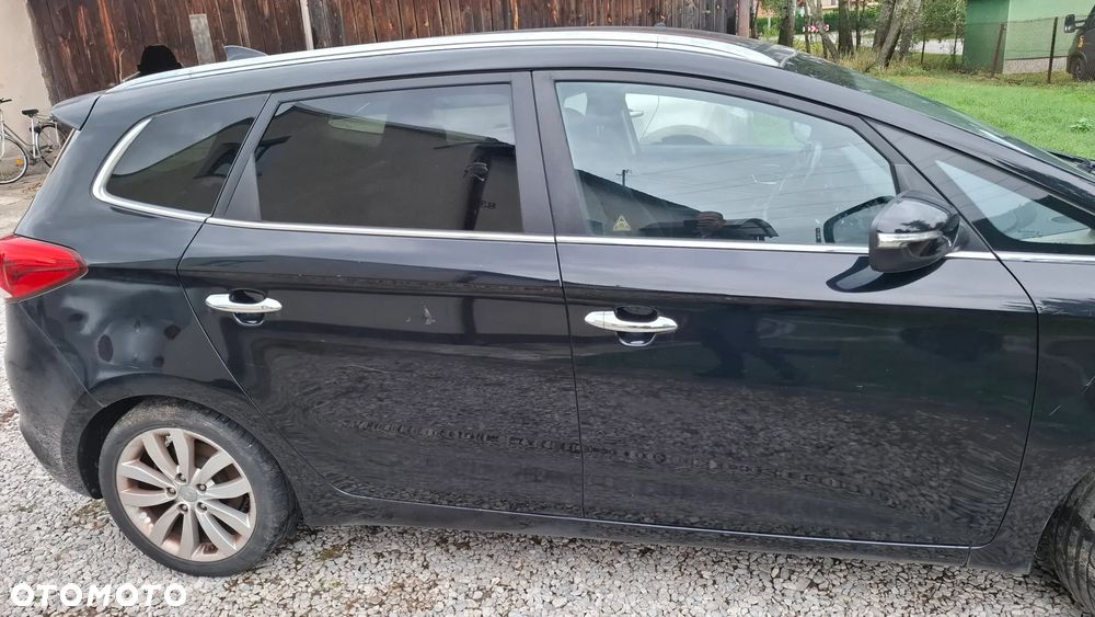 Kia Carens - 3