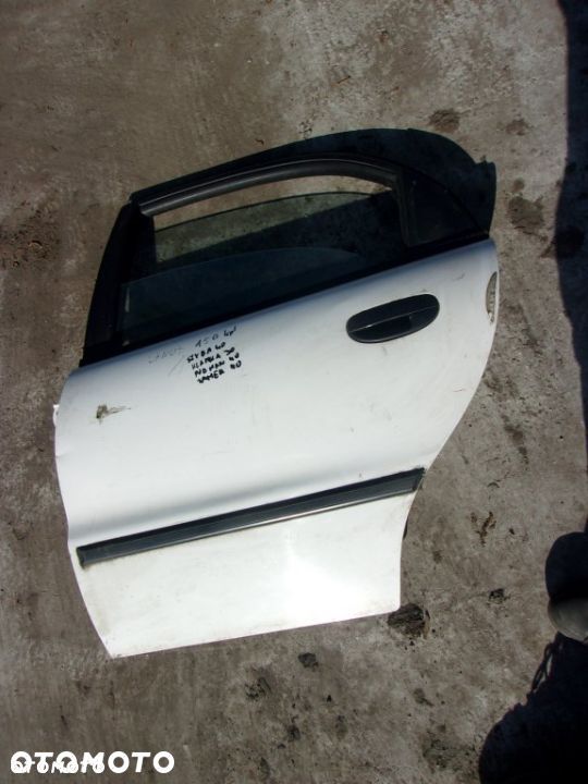 PODNOŚNIK SZYBY DRZWI DAEWOO LANOS LEWY TYLNY - 1