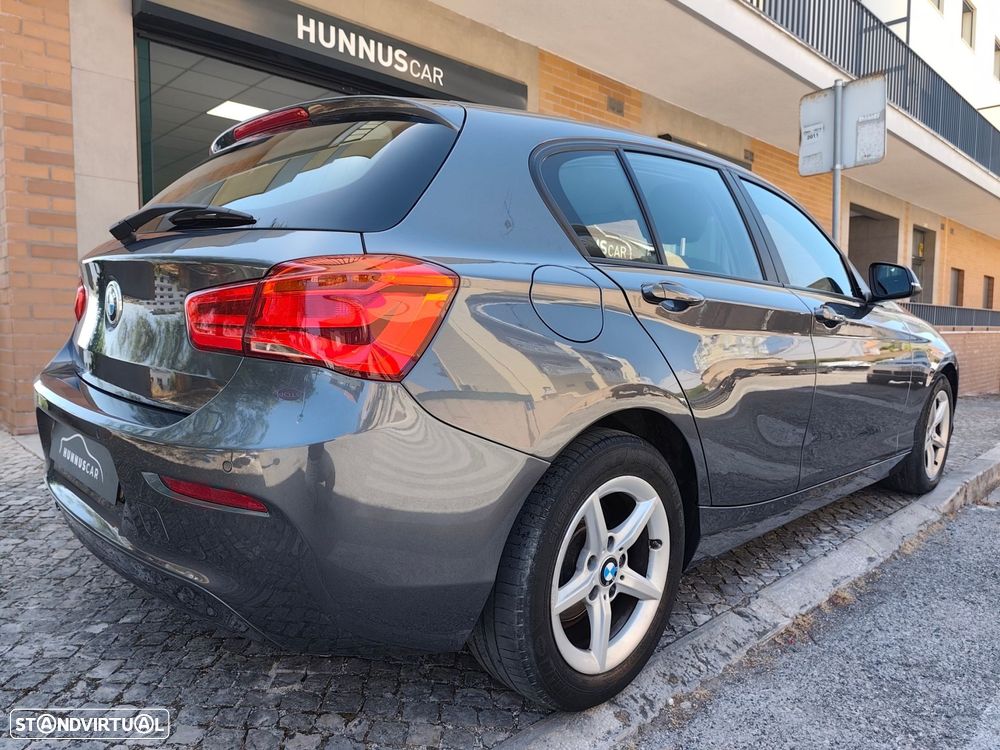 BMW 116 i Advantage — fotografia 17