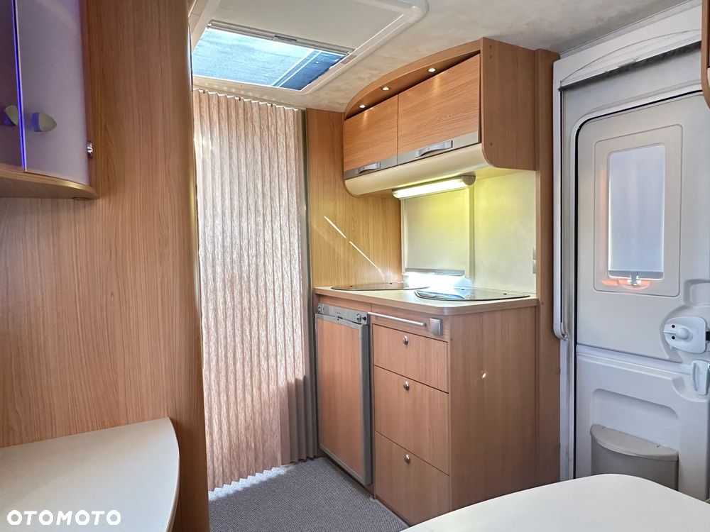 Adria ADORA 472 LU z napędem i markizą ze ścianami.  DMC 1300 - 15