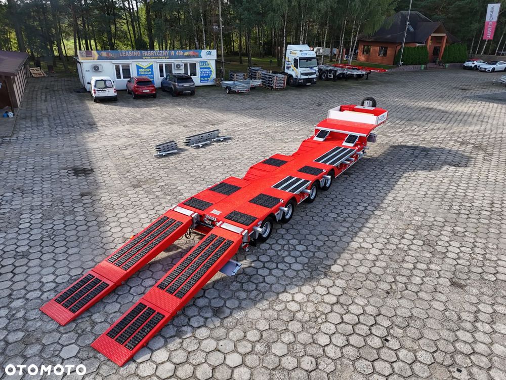 Inny 4 OSIOWA NISKOPODWOZIOWA z zagłębieniami na koła, rozciągana 5.000mm, długie najazdy 70T DMC - 31