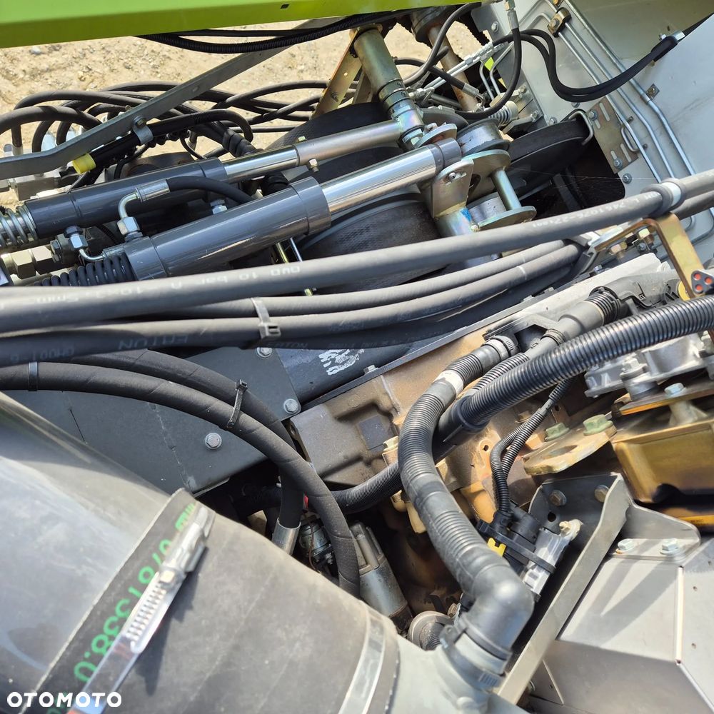 Claas Lexion 750TT z hederem - 25