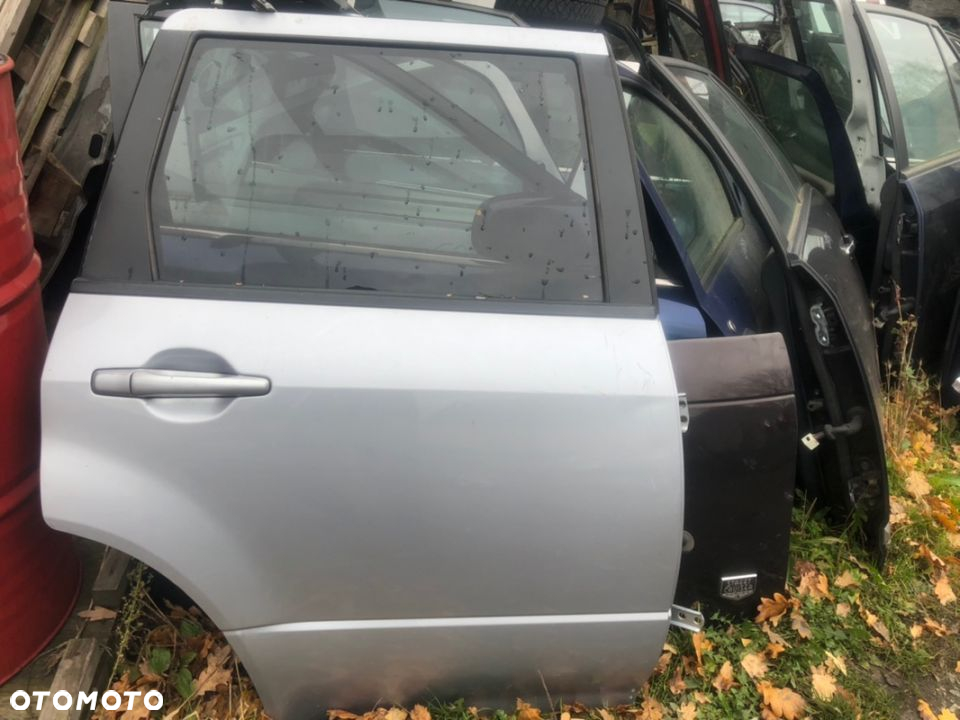 MITSUBISHI OUTLANDER I 03-06 DRZWI PRAWY TYŁ SZYBA PODNOŚNIK ZAMEK KLAMKA - 2
