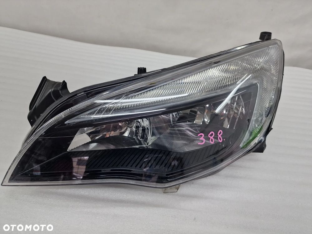 OPEL ASTRA J IV 08-12 LEWA ZWYKŁA CZARNA LAMPA PRZEDNIA PRZÓD , NR 13297722 , NR AUKCJI LL388 - 1