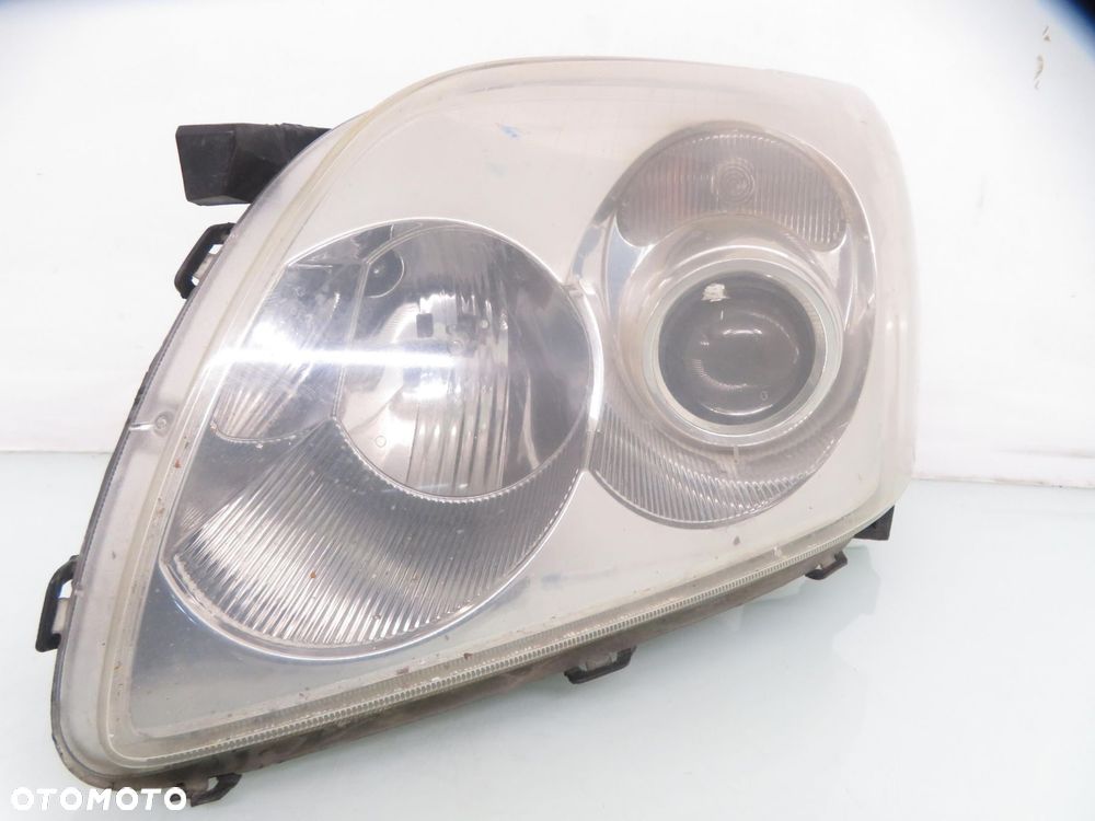 LAMPA LEWA PRZEDNIA TOYOTA AVENSIS II T25 XENON - 12
