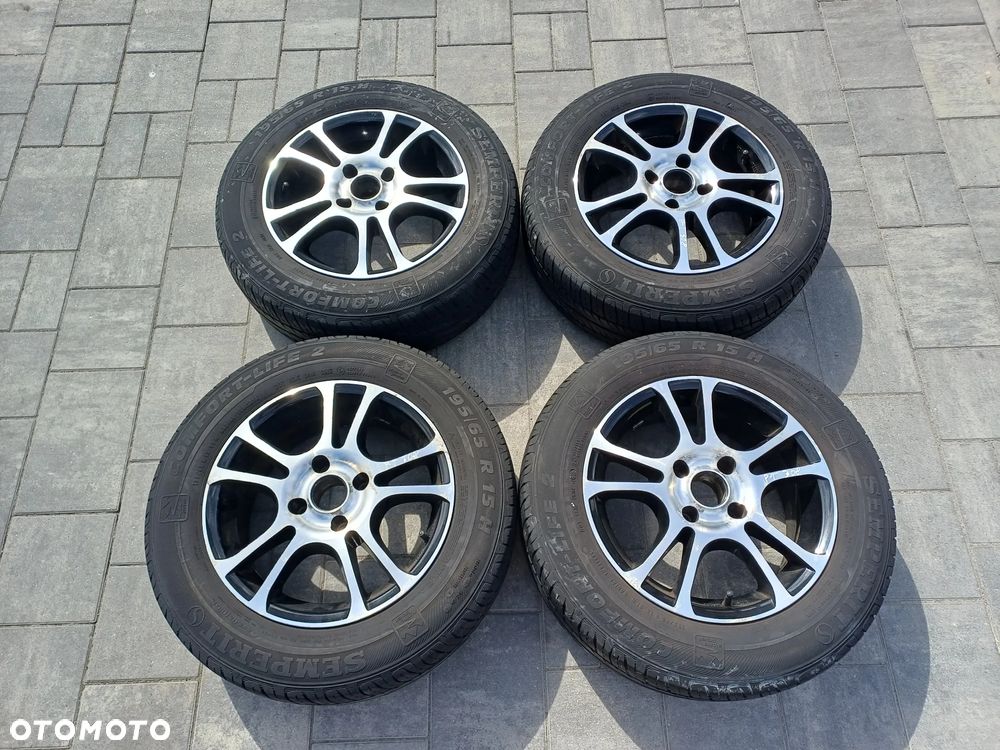 FELGI Z OPONAMI KOŁA ALUMINIOWE PEUGEOT 308 I R15 4X108 ET24 65,1 mm OPONY SEMPERIT 195/65 R15 NR34 - 1
