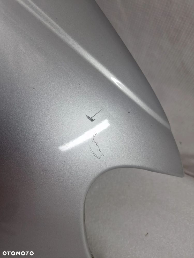 OPEL OMEGA C 99-02 SREBRNY PRAWY BŁOTNIK PRZEDNI PRZÓD , NR AUKCJI BŁ179 - 13