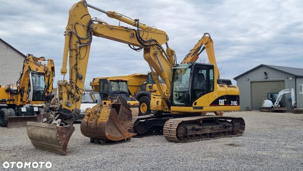 Caterpillar 318C/ Maszyna sprowadzona - 1