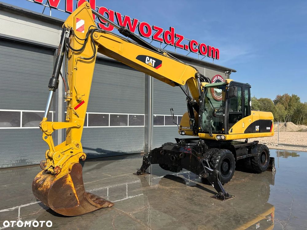 Caterpillar M318D - 3
