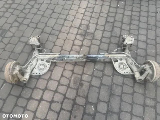 BELKA TYLNEGO ZAWIESZENIA NISSAN NOTE HB 09-13 - 1
