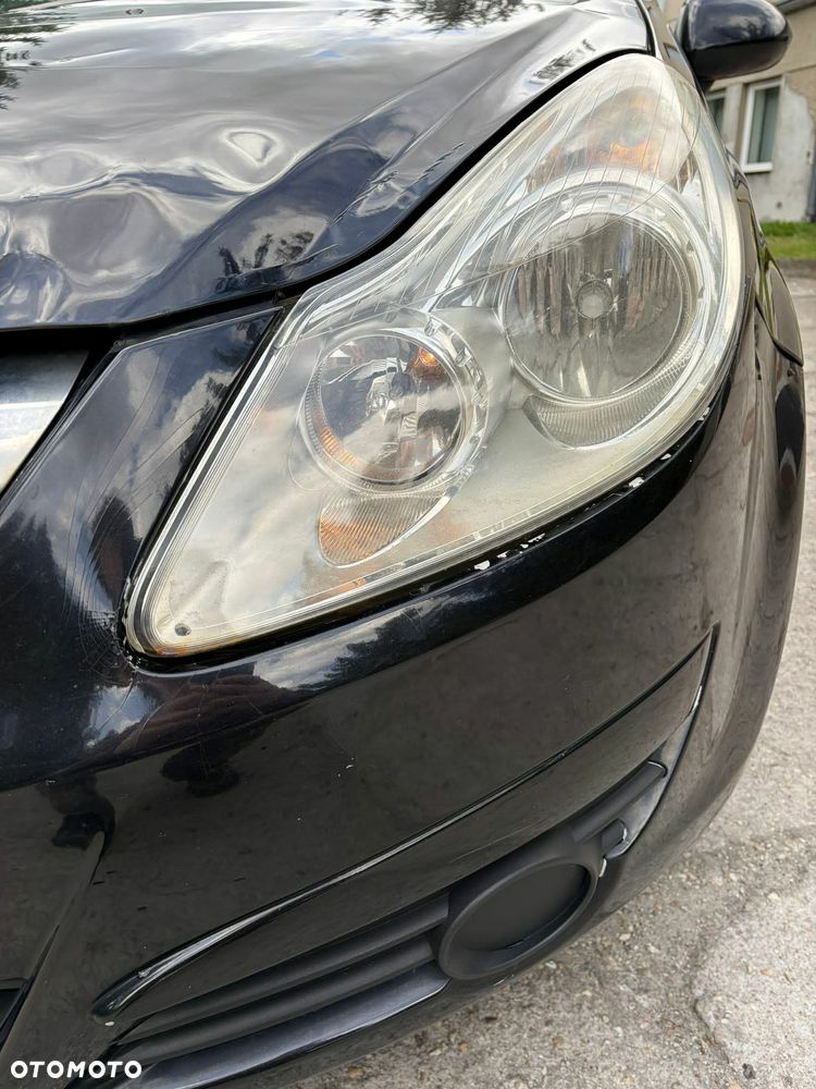 Opel Corsa 1.4 16V Cosmo - 8