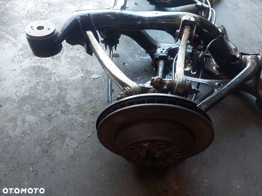 KOMPLETNE ZAWIESZENIE BELKA SANKI TYŁ VW TOUAREG I 06-10r 7L0500041 - 2
