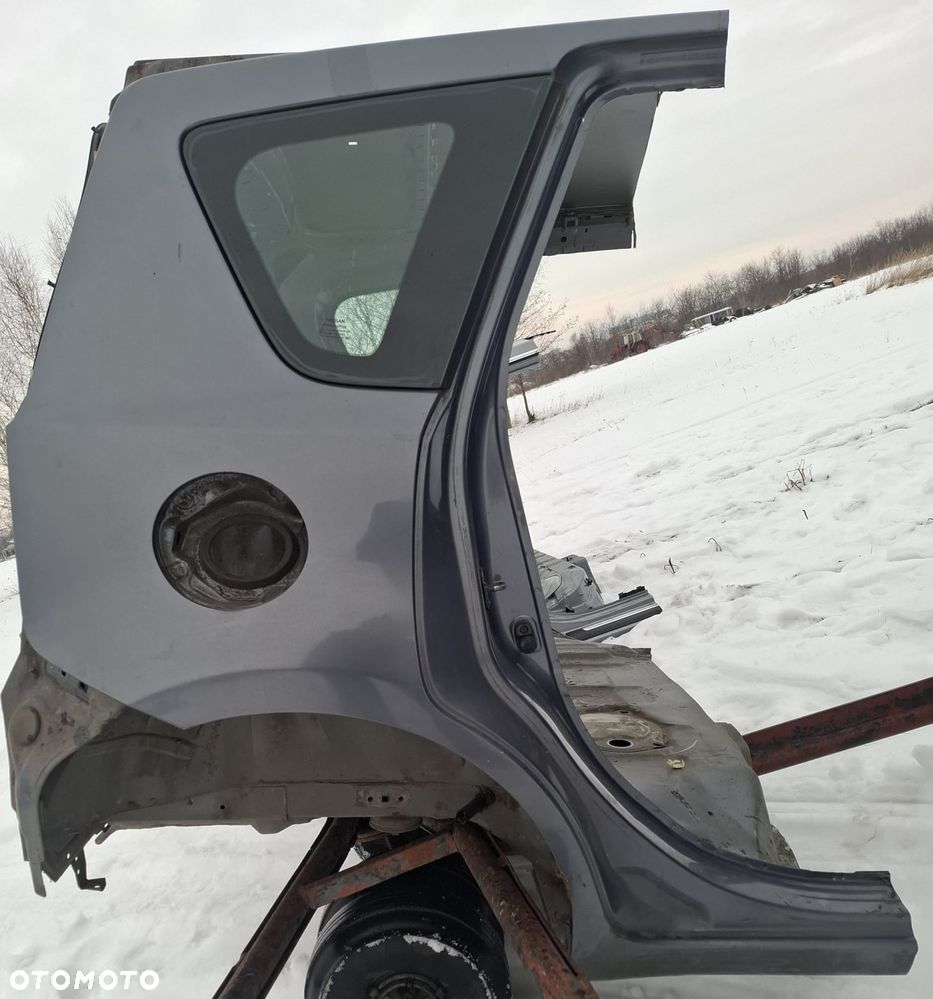 Nissan Note E11 07 błotnik tył tylny  prawy lewy B52G - 4