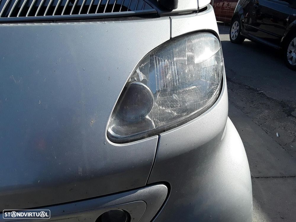 FAROL ESQUERDO SMART CITY-COUPE 2001 - - 3