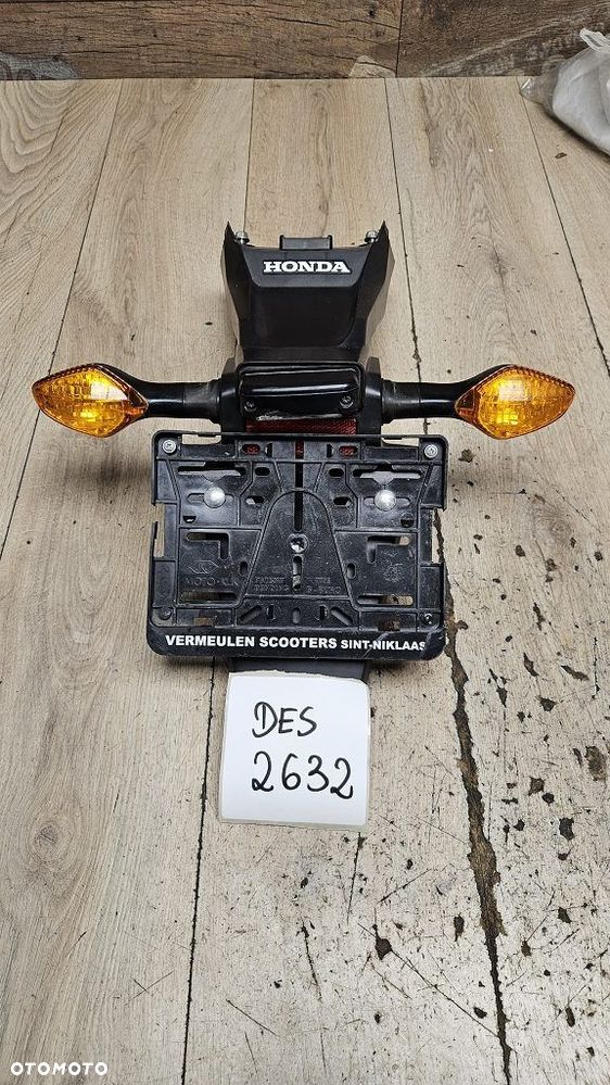 Uchwyt tablicy kierunkowskazy Honda Grom 125 - 1