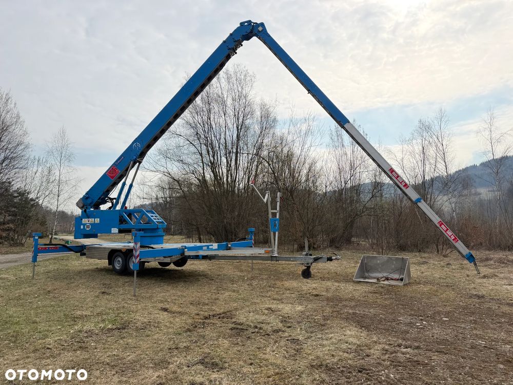 KLAAS K21/31TSR Dźwig Dekarski żuraw zwyżka podnośnik 31m. udźwig 1800kg max. Silnik Yanmar 3cyl. Kosz pojemnik. Dźwig Sterowany całkowicie zdalnie z pilota. Do 3,5 tony Transportowanie samochodem osobowym! Podwieszana oś Hydr. Własny Napęd Hydr. na 2 koła w terenie. Maszyna jak Nowa 2 tyś mtg. 2015r. Po serwisach Dekra. Sprowadzona z Norwegii. Nie różni się od nowej z salonu. Pełna Hydraulika w maszynie. Najbogatsza wersja. OKAZJA  230volt. Zero zużycia! - 22