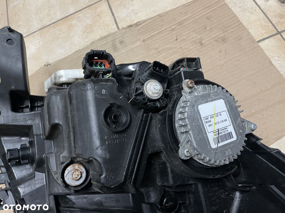 Lampa / reflektor Nissan Navara D23 - lewy przód (ORYGINALNE) - 4