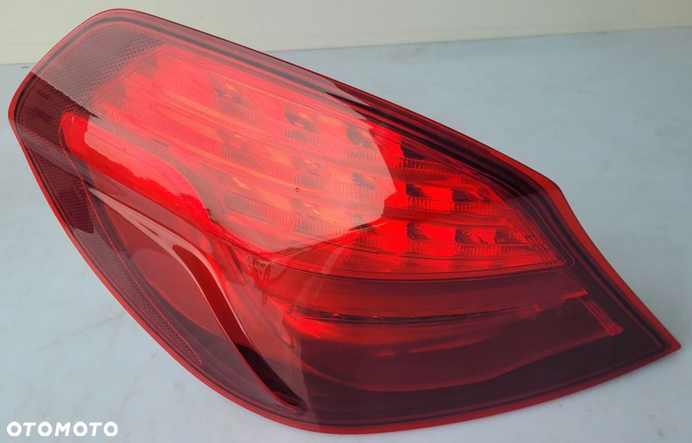 LAMPA LEWA TYŁ TYLNA BMW F12 USA 89505161