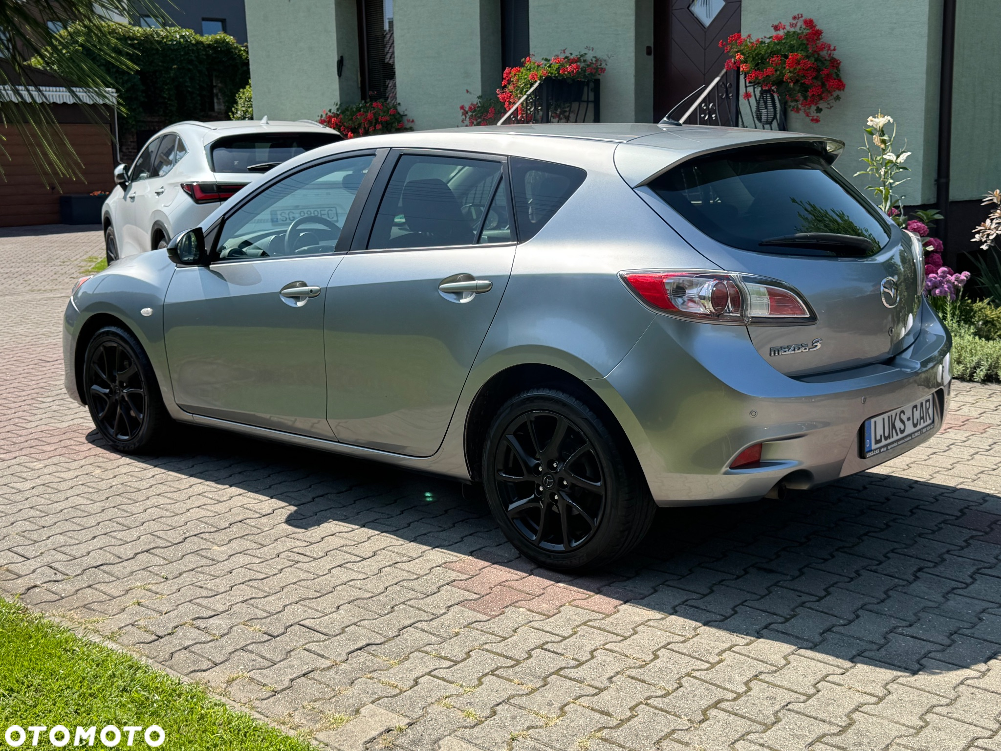 Mazda 3 1.6 Exclusive + - 4