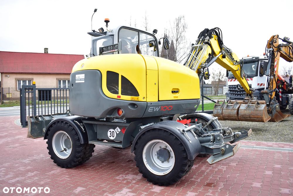 Wacker Neuson EW 100 Koparka kołowa 10.5 T/ Powertilt/ 4 Łyżki/ Podpory + Pług/ 2021/ 3.700 Mth/ Sprowadzona z Austri ! - 12