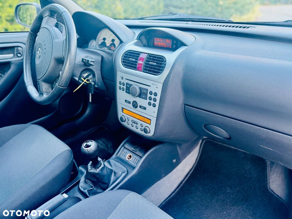 Opel Corsa 1.2 16V Cosmo - 11