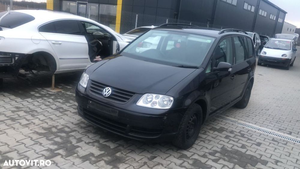 Dezmembram Volkswagen Touran 1.6 benzina an fabr 2006 - 3