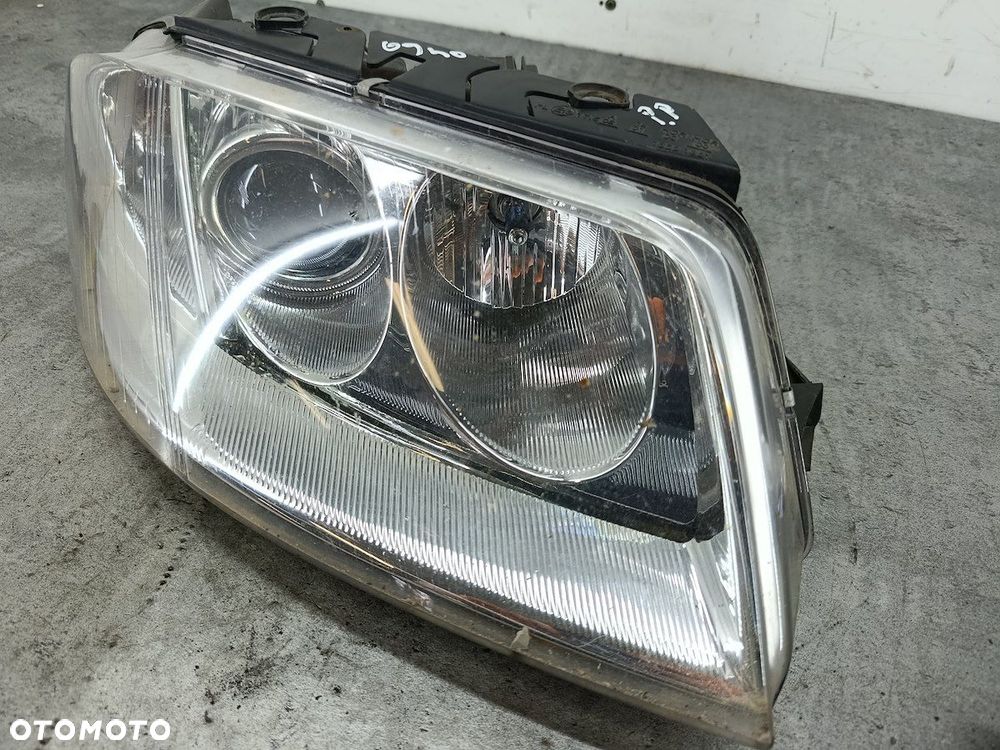 LAMPA PRZÓD PRAWA VW PASSAT B5 FL TYC - 2