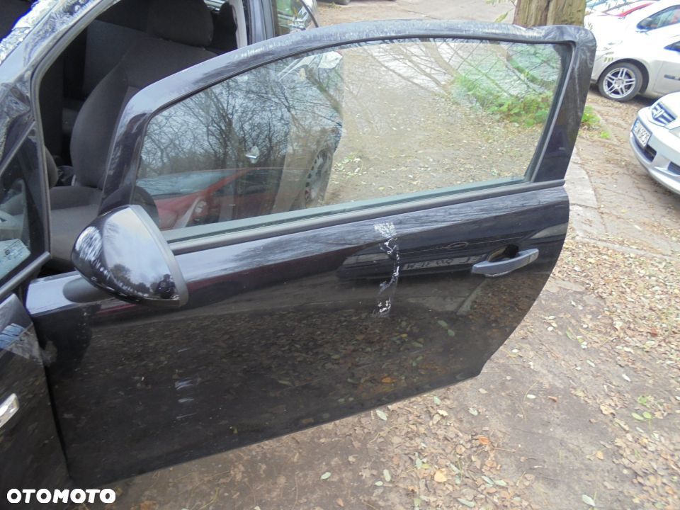 PODNOŚNIK SZYBY MANUAL LEWY OPEL CORSA D 3-DRZWI - 1